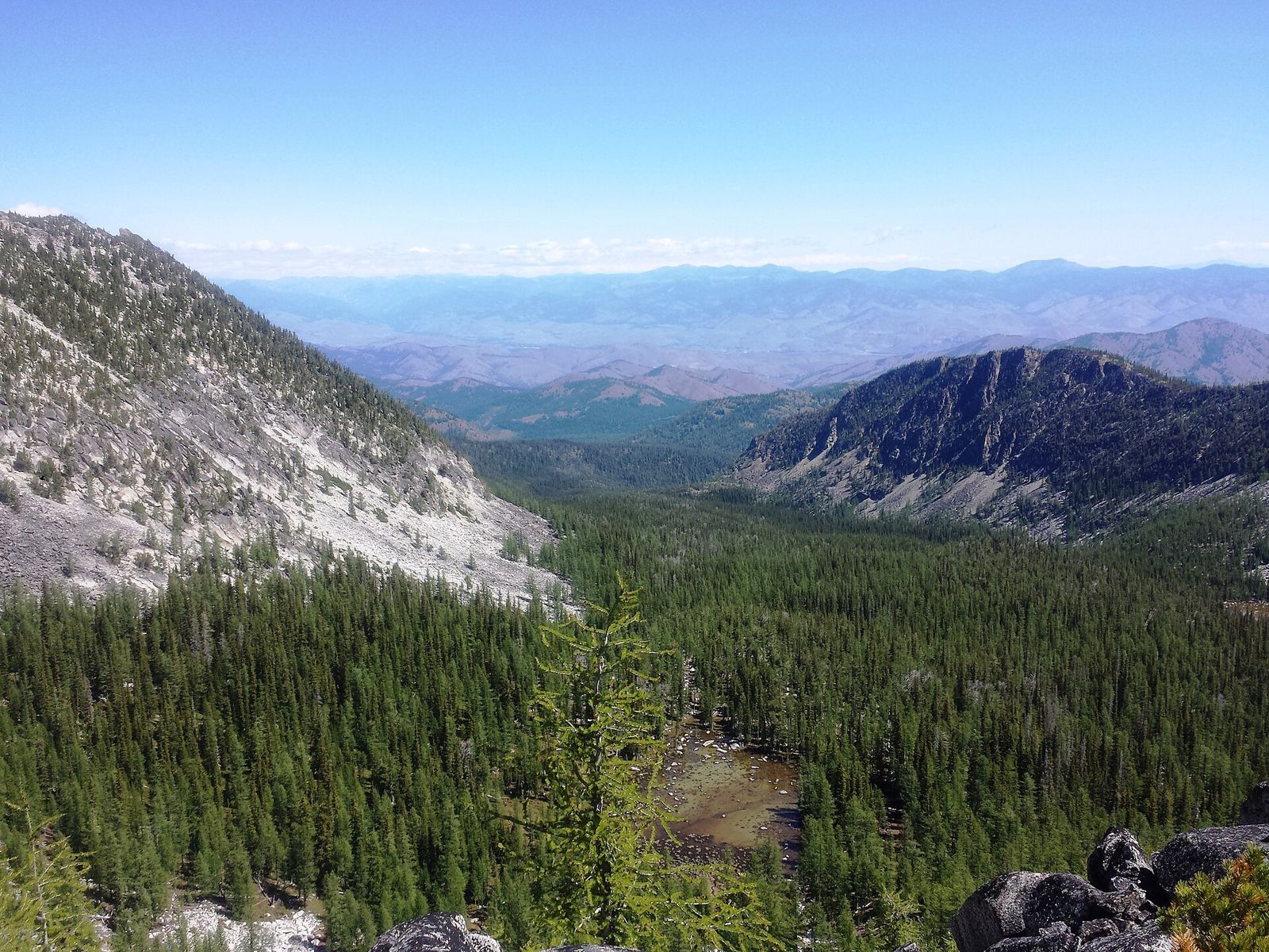 Forested mountains and ridges looking east toward the Methow Valley